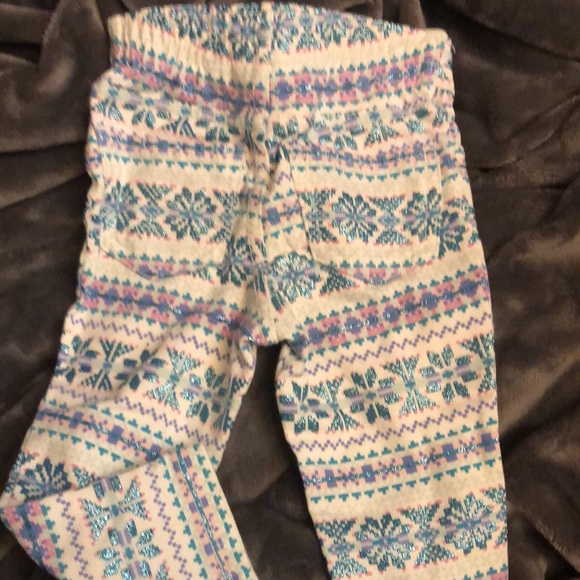 Leggings in snowflake frozen pattern cream with glittery blue and pink - Picture 2 of 3